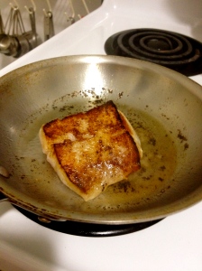 Wait until the pan is HOT HOT HOT and smoking before adding fish or it will not sear!